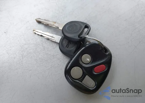 2000 GMC Jimmy Sle z USA, uszkodzony, nr VIN 1GKDT13W2Y2297839